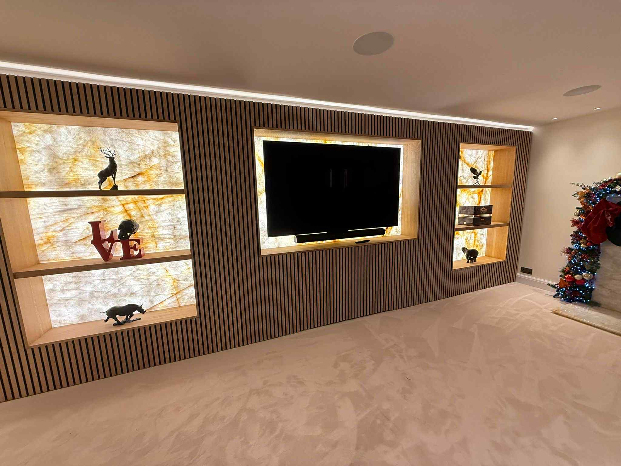 Custom media wall with storage and hidden cable management built in Ashford, Kent