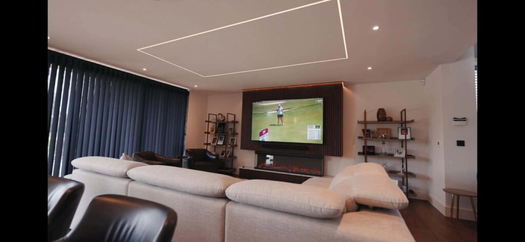 Bespoke Slatted Media Wall With Floating Fireplace & Ambient LED Lighting